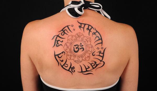 I tried this on r/sanskrit and was recommended here. My friend has this  tattoo and, incredibly, doesn't remember what it says. Any translation help  would be appreciated. TY. : r/Hindi